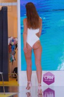 Модель в купальнике на выставке CPM 2018