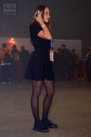 Модель выставки Vapexpo в колготках и мини